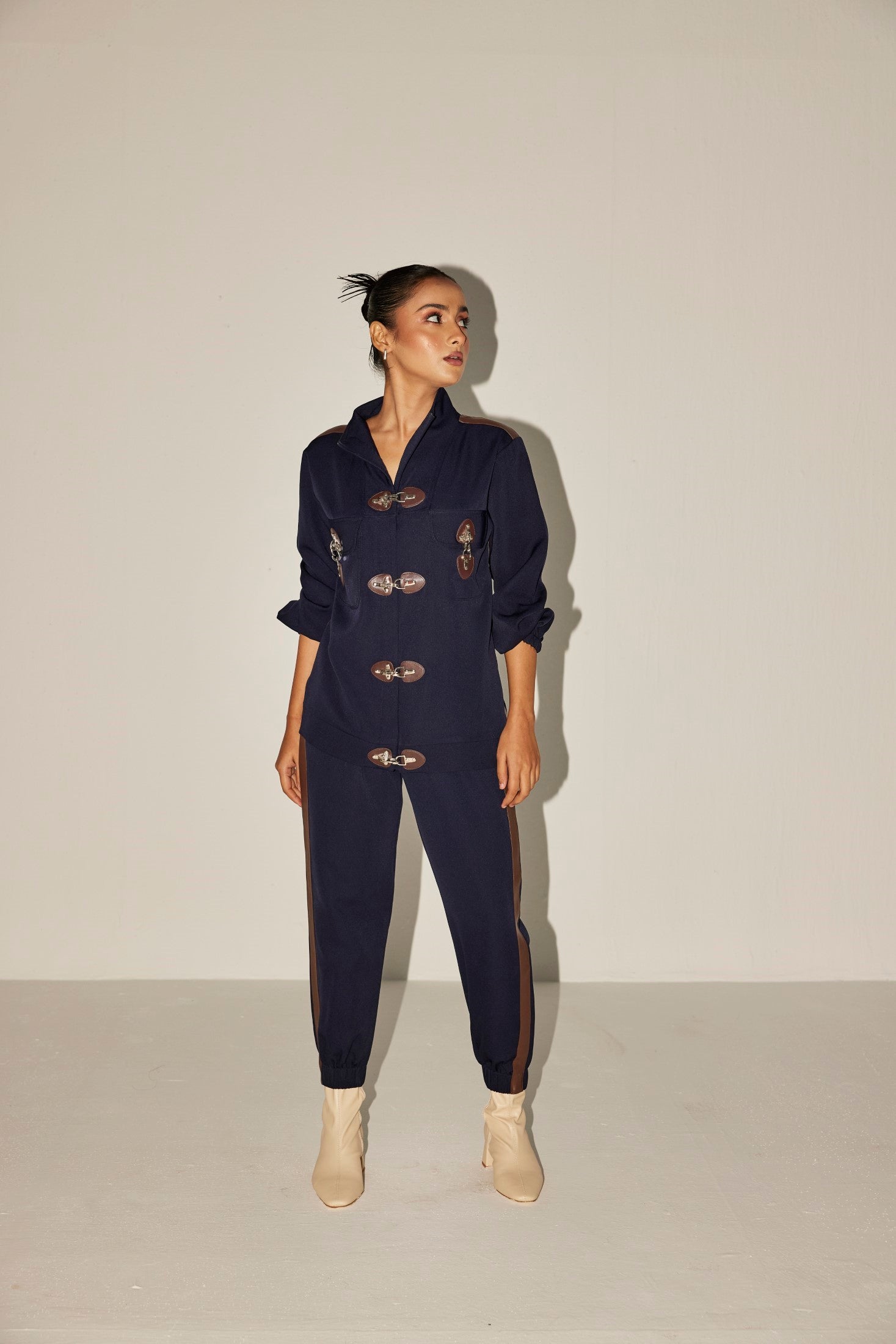 SHARNAMLI IN NAVY BLUE TRACK SET WITH BUCKLES